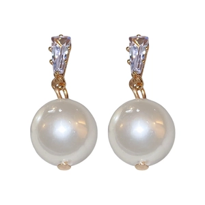 Elegant gold drop earrings with round white pearls and sparkling trapezoid zircons