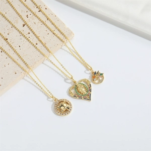 Three elegant gold-plated necklaces with tree of life and zircon heart pendants