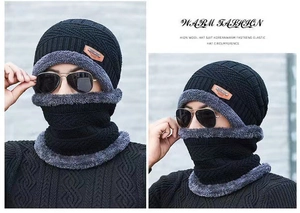 Close-up detail of knitted winter beanie and neck warmer set with soft faux fur lining