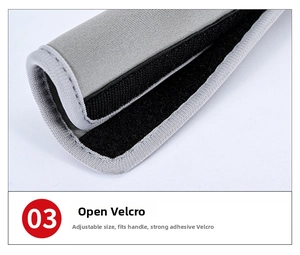 Macro detail of grey refrigerator handle cover with adjustable black hook and loop closure