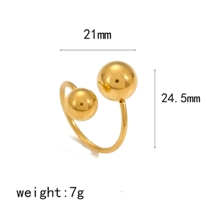 Detail view of gold geometric spherical ring with size 21mm and 24.5mm dimensions
