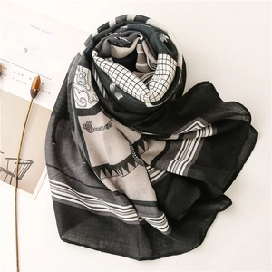 Close-up of geometric printed linen cotton shawl scarf with high-quality fabric texture