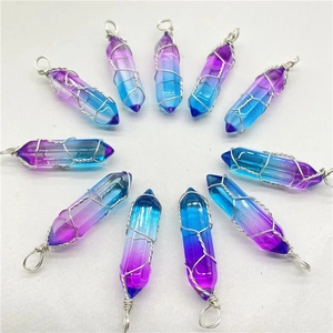 Detailed top view of ten hexagonal wire-wrapped crystal point pendants arranged in a circle