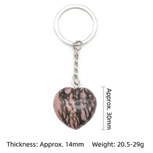 Natural pink agate 30mm heart stone keychain with silver metal ring on white background