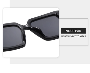 Close-up of lightweight nose pad design on black oversized Y2K square sunglasses