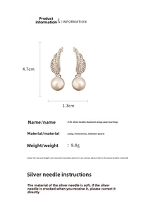 Detail showing 4.7cm wing earrings with pearls, rhinestones and 925 silver needles