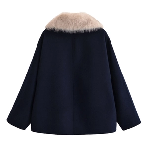 Rear view of navy blue wool coat featuring a detachable beige faux fur collar detail