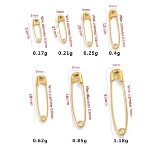 Seven sizes of gold stainless steel safety pins with detailed measurement specifications