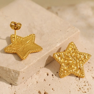 Textured gold star stud earrings with hammered finish and secure butterfly back closure