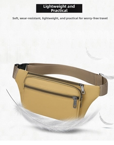 Detail of durable nylon waist bag showing three zippered compartments and adjustable strap