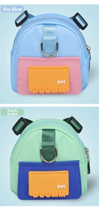 Detail of waterproof nylon pet backpack harness in sky blue and green colors