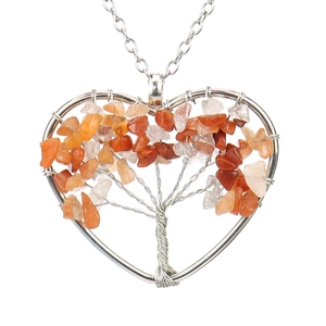 Detailed view of silver wire tree of life heart pendant with colorful crystals