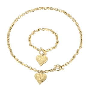 Golden hip-hop jewelry set featuring chunky link chain with engraved heart pendant and OT toggle