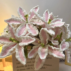 Handmade crochet pink and white lily bouquet in a decorative paper bag gift