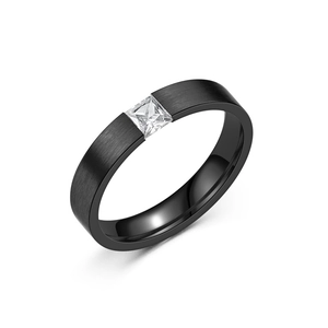 Minimalist black brushed titanium ring with center square zircon on white background