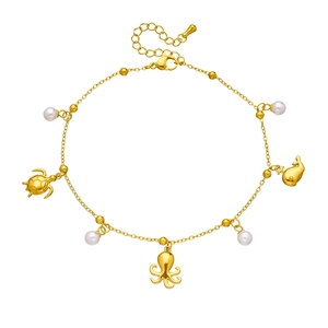 Golden starfish and turtle charm anklet with pearls on a polished stainless steel chain