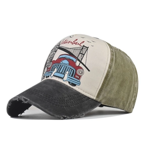 Detail of vintage Istanbul baseball cap featuring distressed brim and retro car print