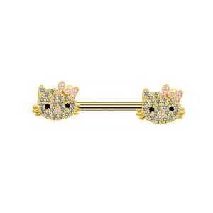 Close-up of gold-tone nipple ring featuring a rhinestone-paved cartoon cat design