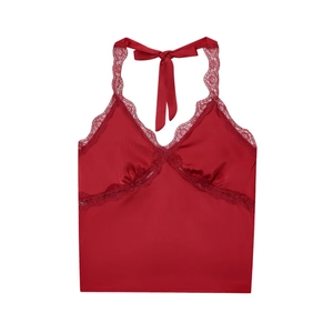 Detail of burgundy satin halter top featuring a V-neckline with delicate lace trim