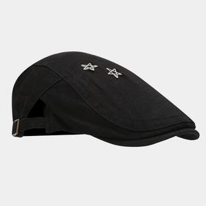 Side view of black flat cap with two silver star-shaped metallic decorations on top