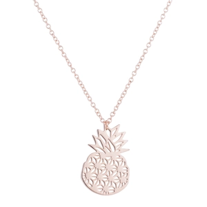 Close-up of rose gold hollow pineapple pendant with intricate geometric cutouts