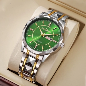 Detailed macro of green sunburst dial watch with dual calendar and gold steel band