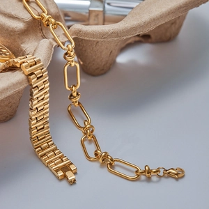 Luxurious gold stainless steel spliced Cuban chain bracelet with oval links and lobster clasp
