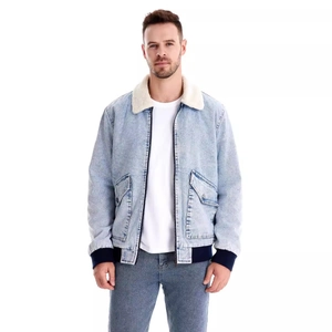 Detail of fleece collar and ribbed cuffs on men's winter denim jacket for warmth