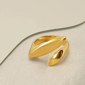 Minimalist 18k gold irregular geometric open ring with polished metal texture