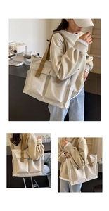 Three-way view of a large beige canvas tote bag with brown straps in a cafe setting
