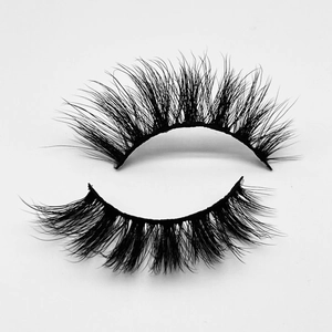 Detailed view of dense and curly short black mink-style false eyelashes with stiff stems