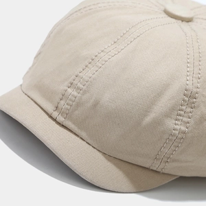 Close-up of beige miki hat featuring twill cotton texture and durable stitched seams