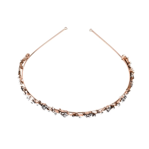Serre-tête de mariée élégant en or rose avec strass brillants et design de fleurs