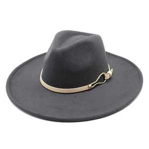 Detail of dark grey wool fedora with beige leather band and golden metal buckle