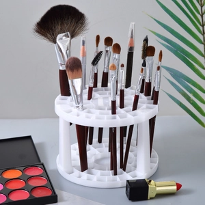 Multi-slot circular makeup brush holder and pencil organizer in minimalist white plastic