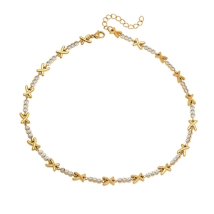 French style luxury X-shape titanium steel necklace with inlaid diamonds on white background