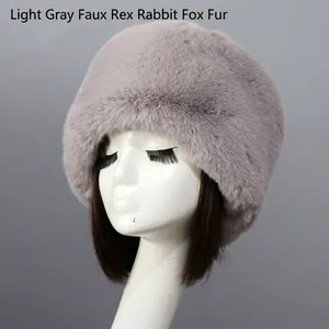 Detailed texture of thick light gray faux fur on a warm Russian style winter hat