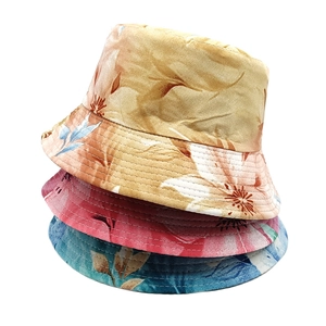 Set of three colorful floral print sun hats for beach vacations and outdoor protection