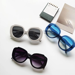Three colors of oversized irregular frame sunglasses with gradient lenses for women