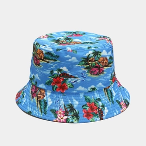 Detailed front view of reversible sun bucket hat with blue tropical Hawaiian floral print