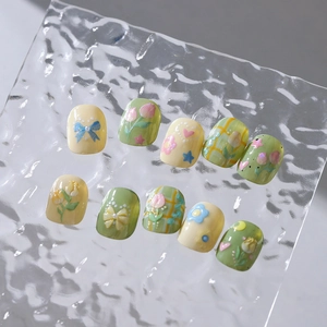 3D floral nail patches with hand-painted tulips and pearls in green and yellow tones