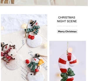 Detailed view of resin snowman ornaments and candy canes for Christmas tree decoration