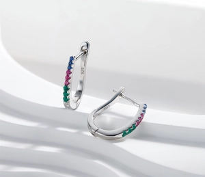 Detail of S925 sterling silver U-shaped earrings featuring colorful zircon inlay crystals
