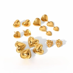 Detail of vacuum-plated 18K gold heart earrings with non-fading nano coating