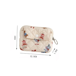 Detail of quilted cartoon coin purse with snap button and animal prints 12.5x10cm