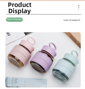 Portable glass water bottles with leather sleeves and phone holder handle in pastel colors
