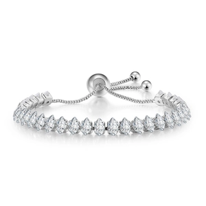 Detail of adjustable silver tennis bracelet featuring marquise-cut marquise stones