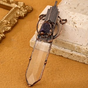 Vintage bronze sword pendant with white crystal prism and raw amethyst stone jewelry
