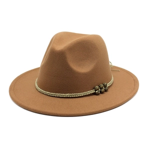 Detail of khaki wool fedora hat featuring woven band and vintage metal beads