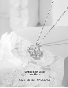 Detail of S925 sterling silver ginkgo leaf pendant with sparkling micro-inlaid zircons